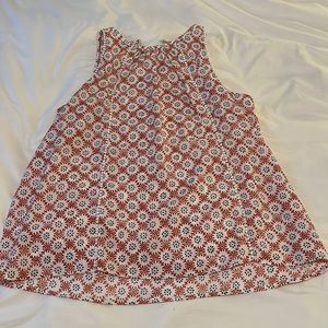Ann Taylor orange patterned blouse with white scallop detail